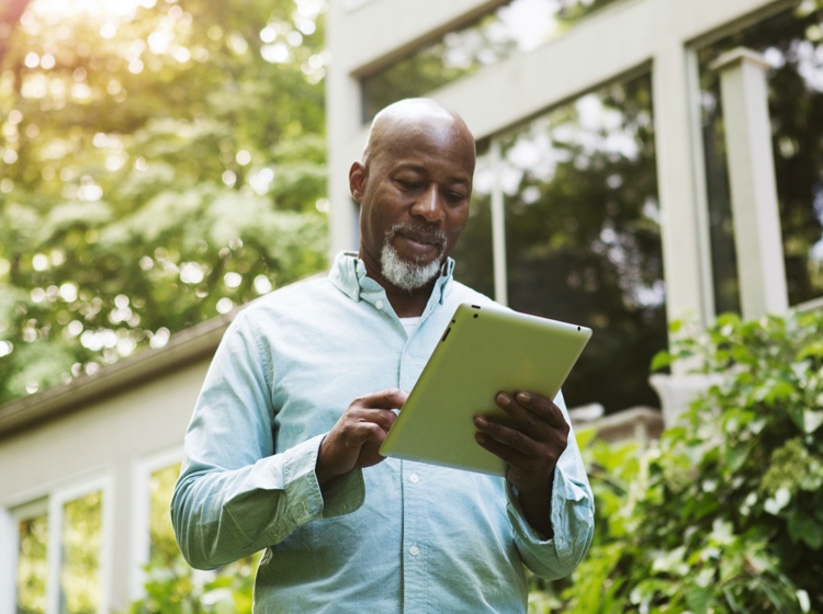 Man reading tablet